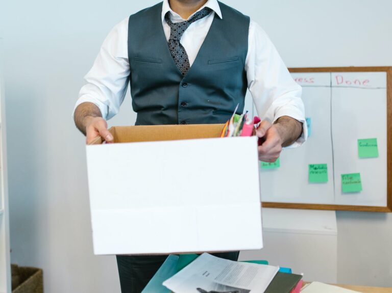 man carrying a white box