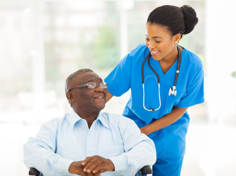 agilemktg1 beautiful african nurse taking care of senior patient in wheelchair Marietta-respite-care-GA