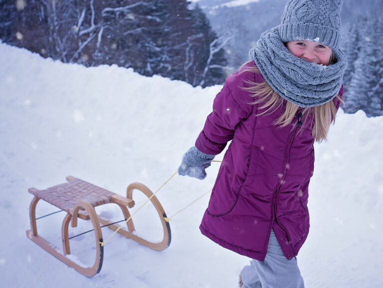 beige wooden snow sled, person, human, child, girl, toboggan